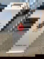 Logo HOREX auf einem weißen Stand, mit rotem Logo und Text 