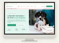 Website Mockup einer Tierarztpraxis mit moderner Tiermedizin und Hund auf Desktop Monitor