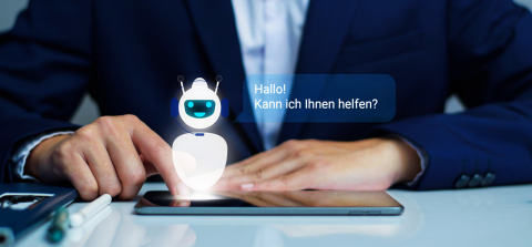 Digitaler Assistent auf Tablet im Business-Umfeld Geschäftsmann interagiert mit einem digitalen Assistenten auf einem Tablet, Sprechblase mit 'Hallo! Kann ich Ihnen helfen?'